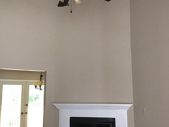 Fireplace and High Ceiling