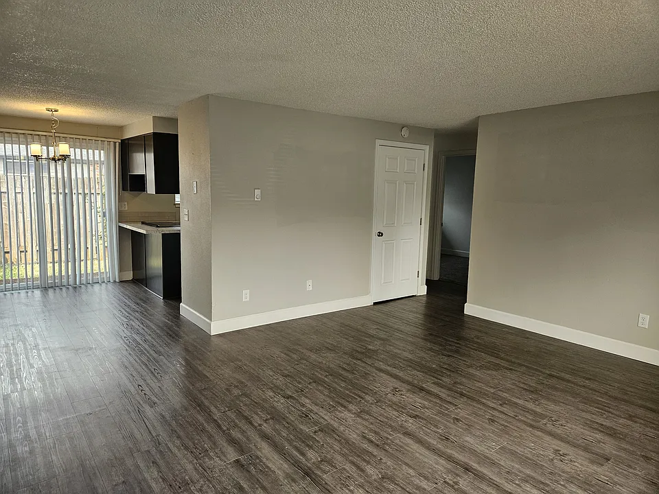 # 7 view from living room into kitchen/dining/hall