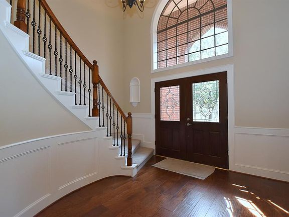 Elegant two story grand foyer.