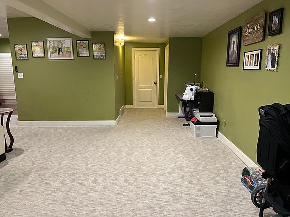 Entry way looking toward laundry room and game closet