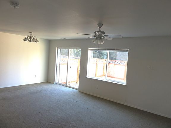 Living room and access to back yard
