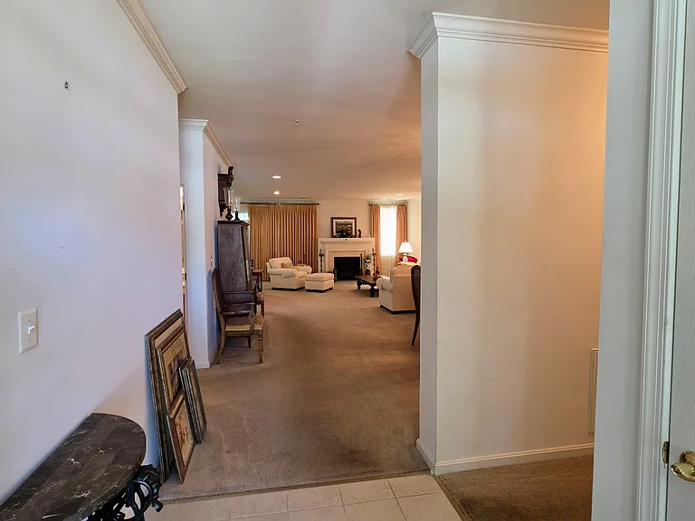 A welcoming entry that flows seamlessly into an expansive, open-concept living and dining area.
