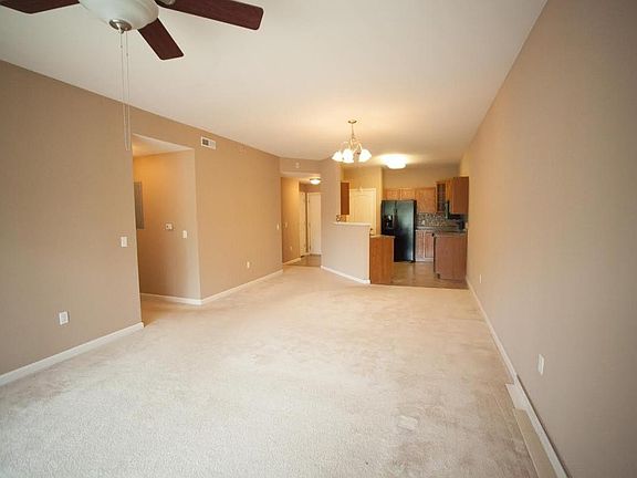 Living room looking into kitchen