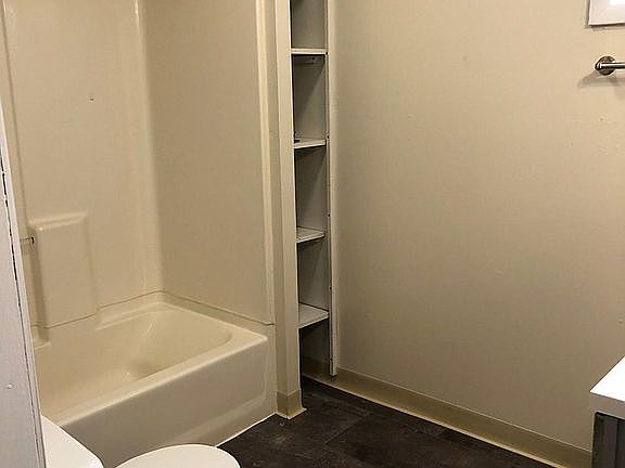 Large bathroom with built-in storage