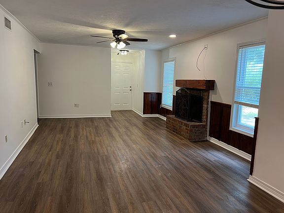 den from kitchen area looking at front door