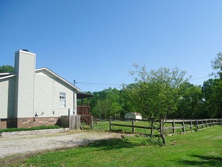 House from driveway sideview