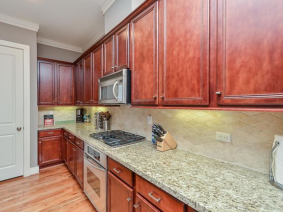 Large kitchen with tons of cabinets and a pantry