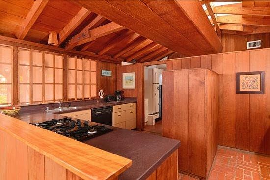 Kitchen with pantry in background.