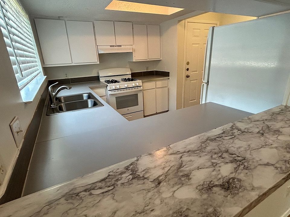 Breakfast bar and window to kitchen