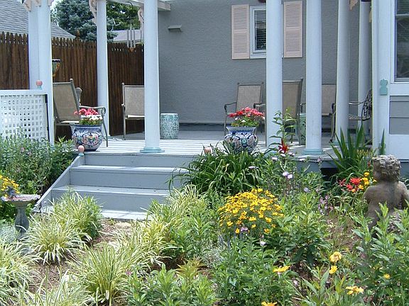 large deck with pillar arbor