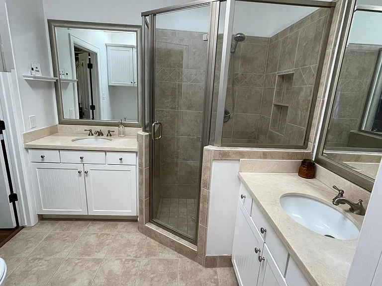 Master Bathroom with Double Vanity and Walk-in Shower.