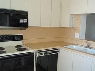 4th image of 2617 Cove Cay Dr Unit 409