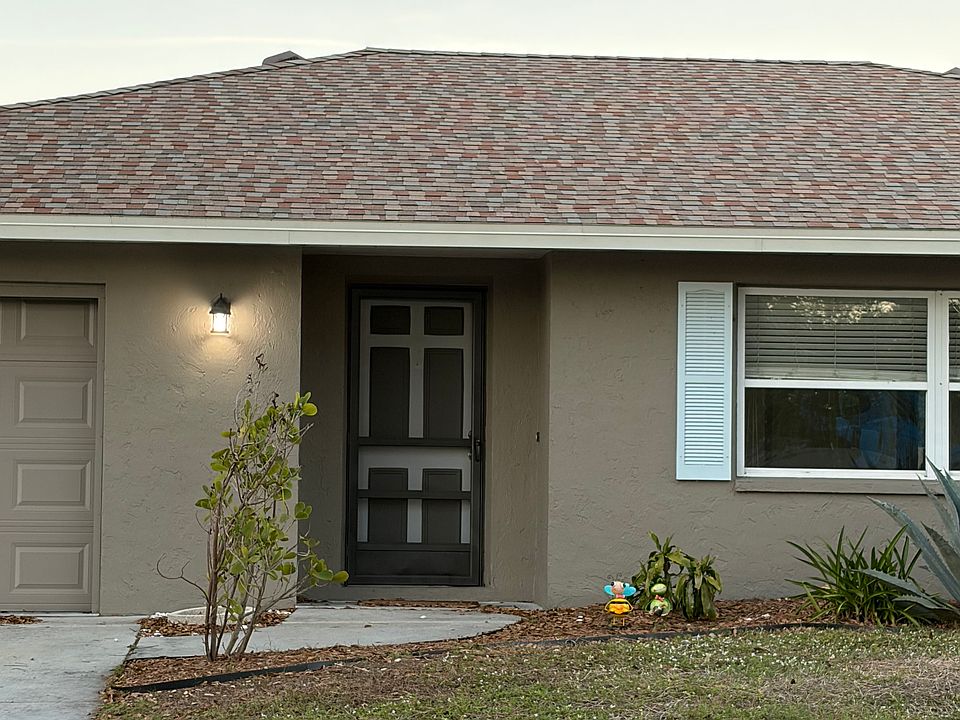 Outside lights by front door and garage. There is also a motion sensor security light by the side garage door entrance entrance.