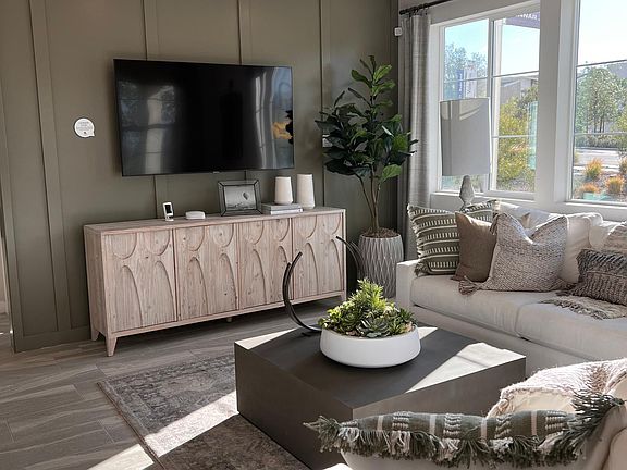 Living room with large couch and TV
