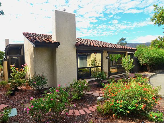 Home has reflective tinting for temperature control and privacy.