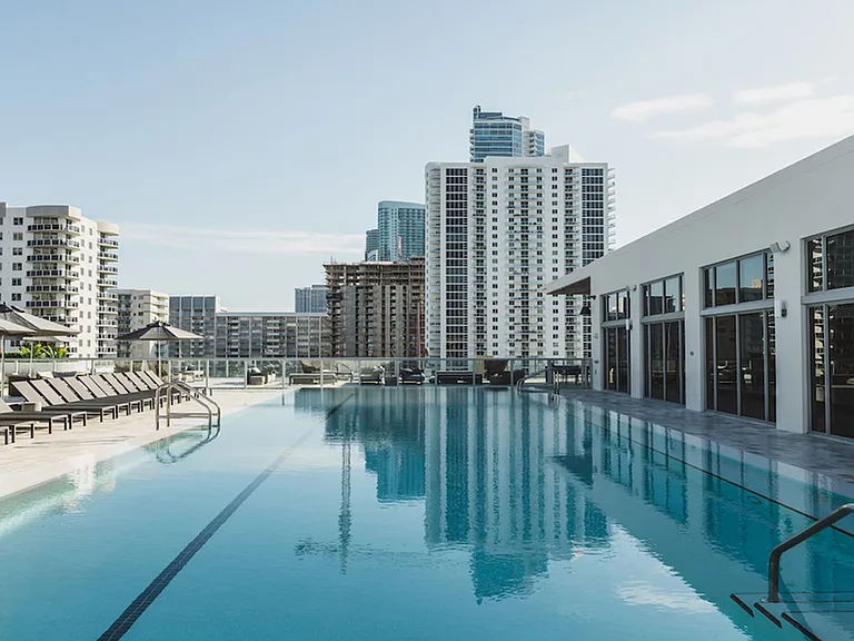 Swimming Pool with sundeck and loung areas