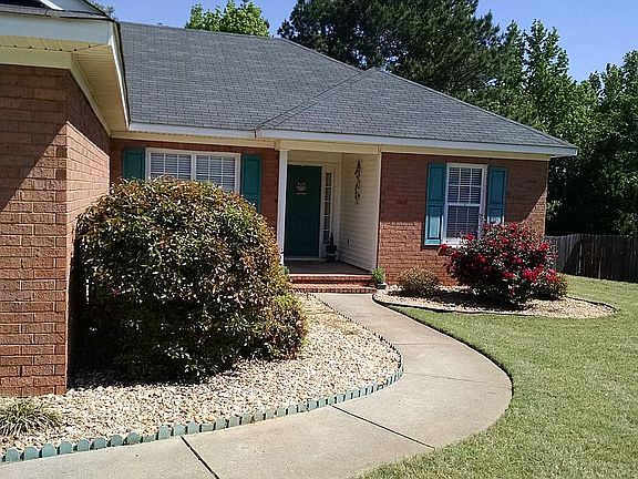 Front walk up w/rose bush