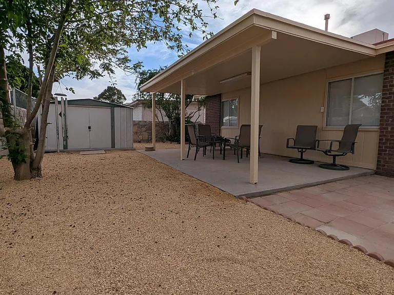 Backyard with porch.