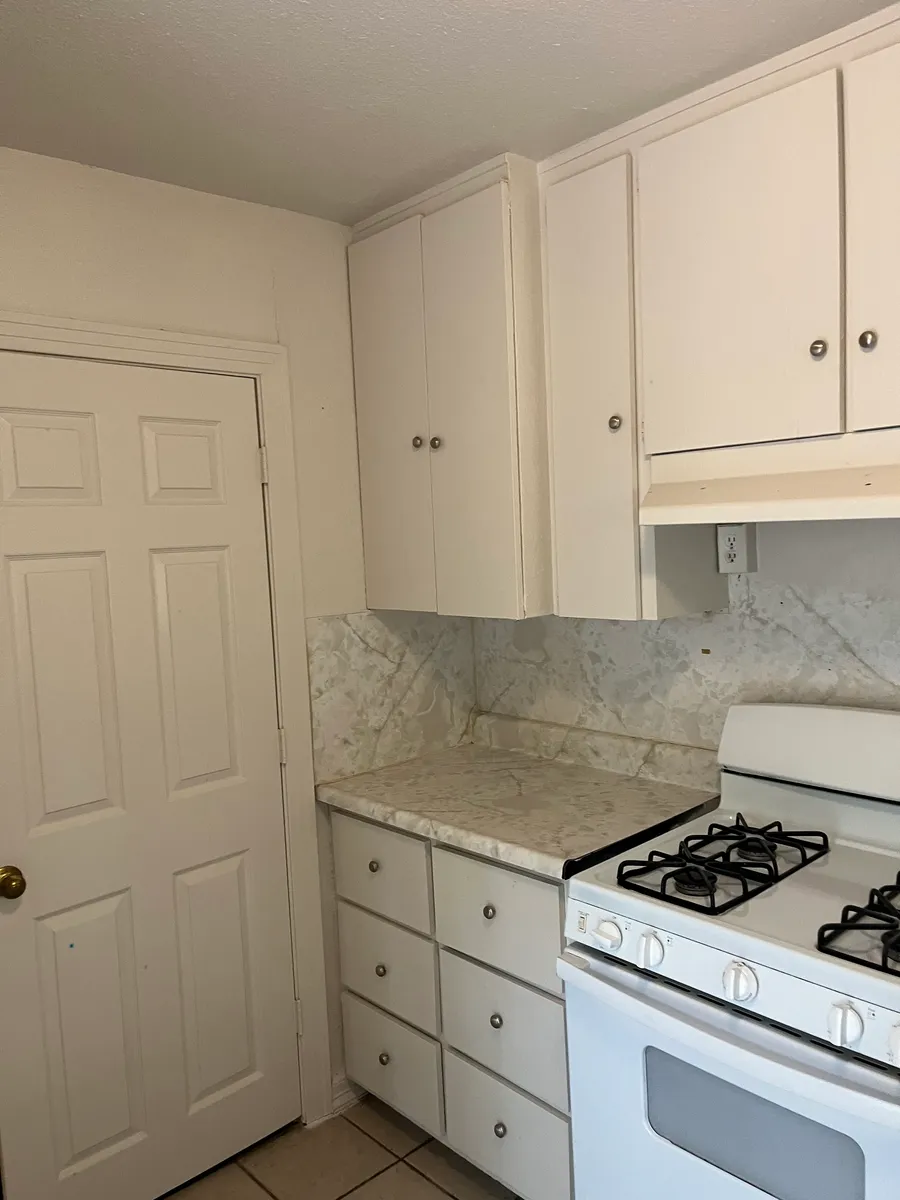 Kitchen leading to laundry nook - 4358 Marks Pl