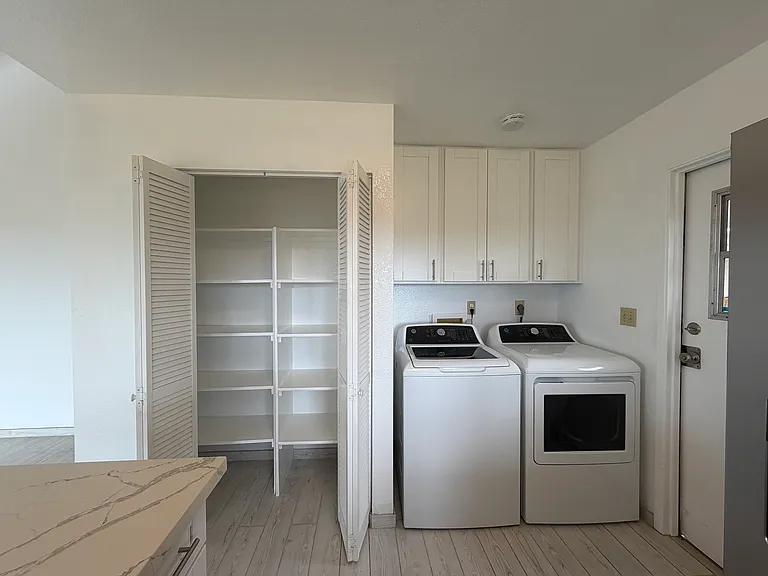 Large pantry and newer Washer and Dryer just 1 year old.