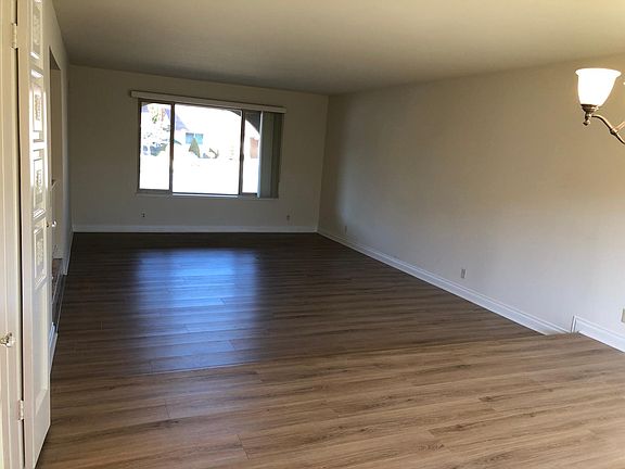 Large Living Room with connected Dining Area great for entertaining.