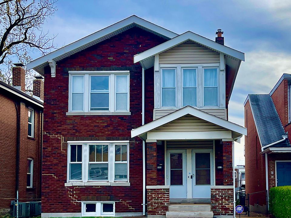 Welcome to 6080 Arsenal St. Unit "a" is the door on the right leading up to the second story.