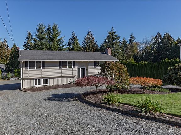 Favorite Feature:  The oversized 2 car garage opens on the backside of the house! 