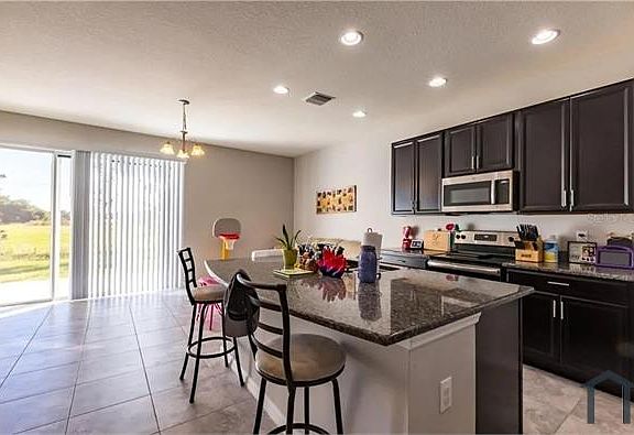 5th image of 7110 Grand Elm Dr