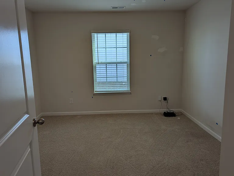 Bedroom 4 / Office - Paint repair in process on wall.