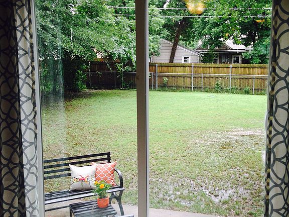 Den overlooking backyard