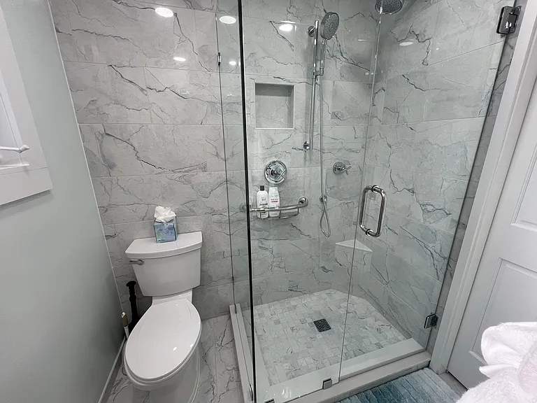 Guest bathroom with walk-in shower.