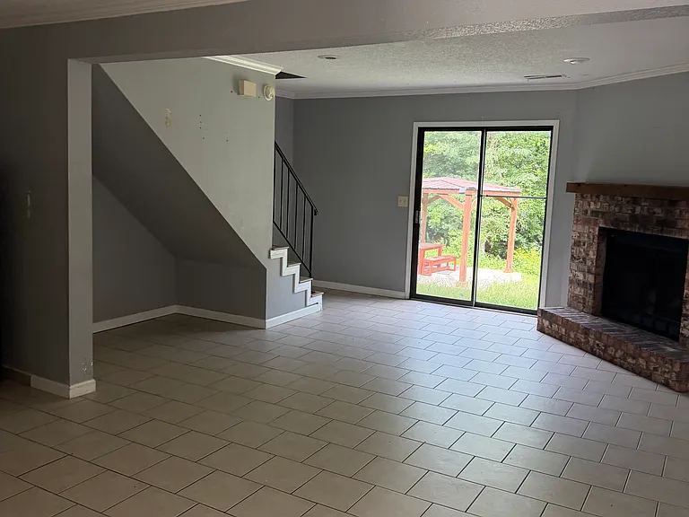 Tile main level with fireplace!