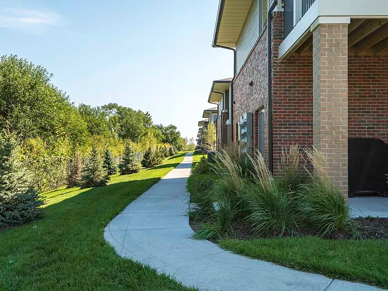 Relax in your outdoor space surrounded by lush landscaping and serene views.