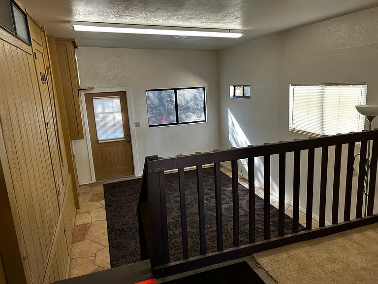 Another view of Bonus recreation room, door opens to deck and back yard