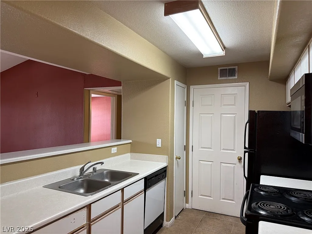 Building Photo - 2300 Silverado Ranch Blvd #2047