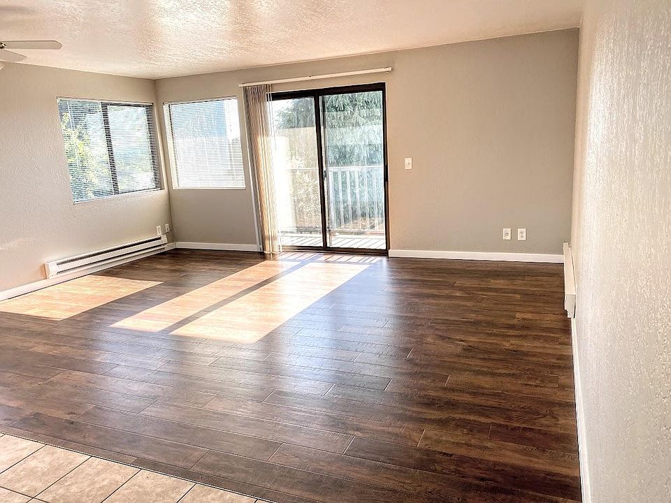 Bright, well ventilated living room with large balcony