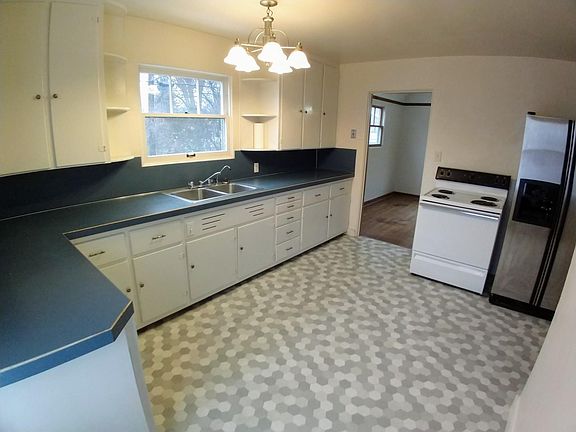Kitchen with dining room in back