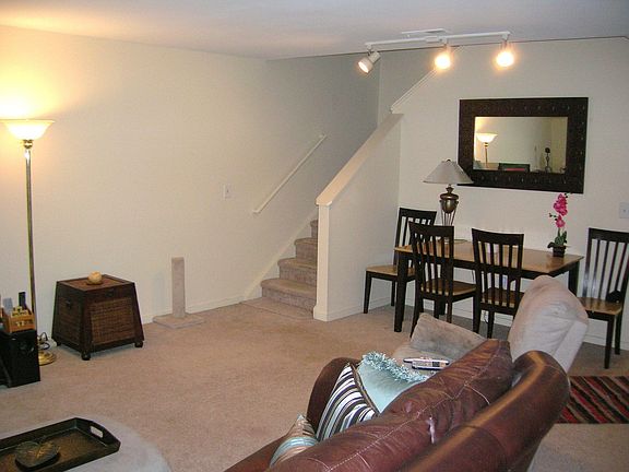 Living room with stairs to upper level