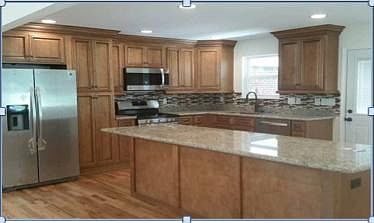 Beautiful kitchen with large granite island.