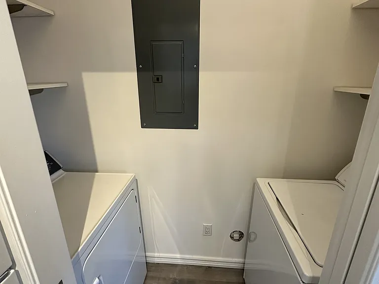 W/D in pantry closet off kitchen.