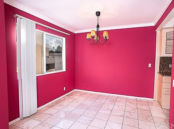 Dining area with chandelier.
