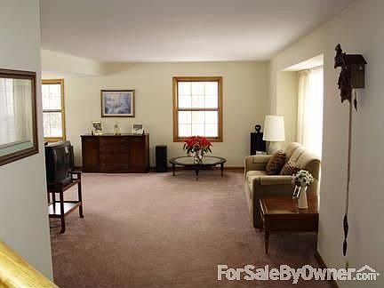 Living Room : Hardwood Floors concealed under carpeting