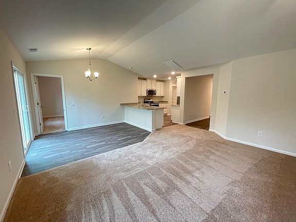 Open concept living room / dining room / kitchen