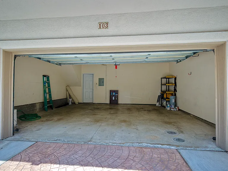 Spacious 2 car garage with room for storage.