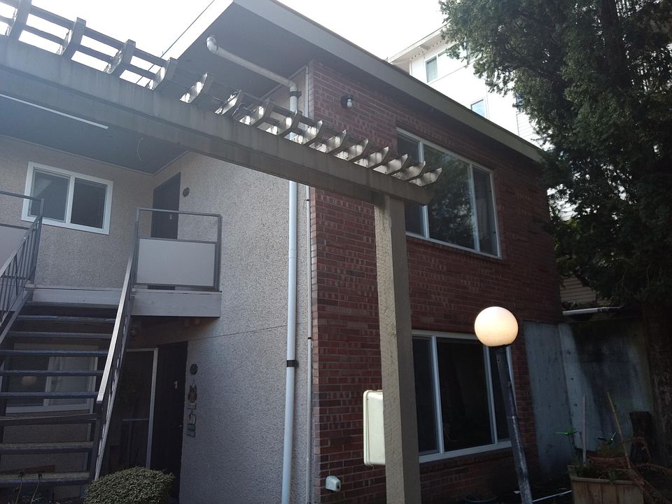 Upstairs apartment on west end of building