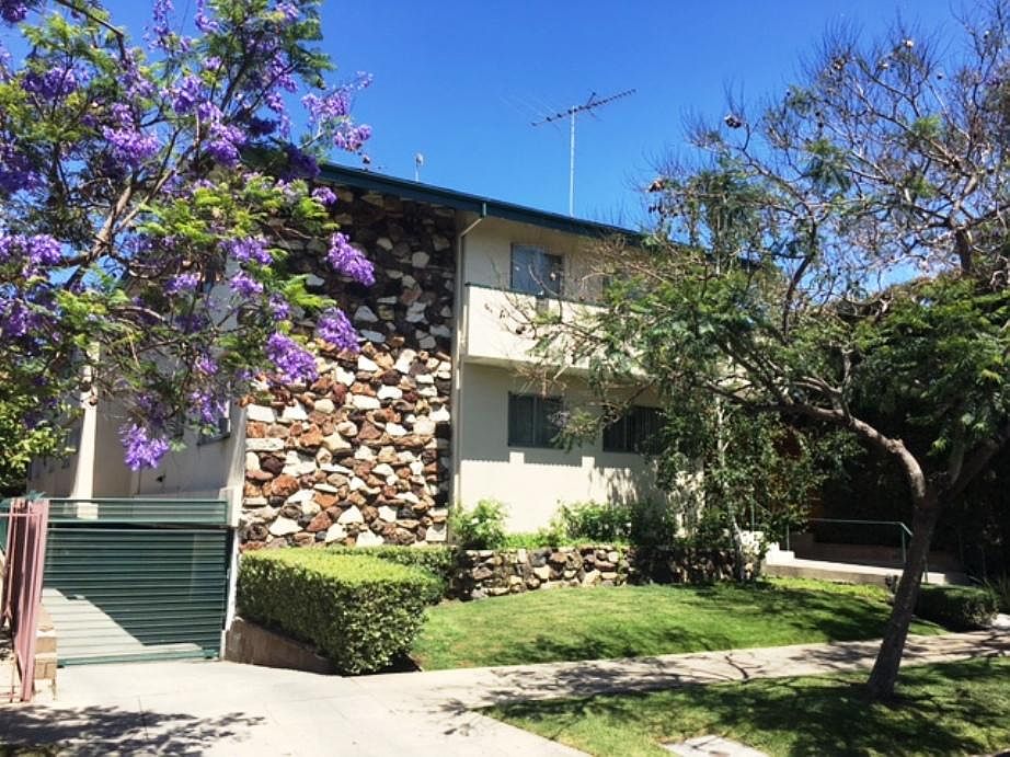 STREET VIEW AND GATED SUBTERREANEAN PARKING AREA