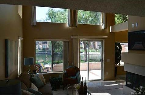 ABSOLUTELY ADORABLE!!! NOTICE  ELEVATED CEILING WITH HUGE WINDOW