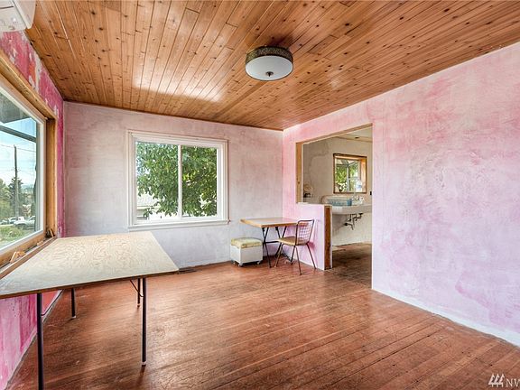 Wood Floors & Large View Windows