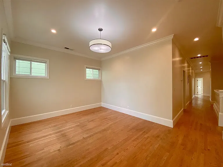 Living room off kitchen, bedrooms and bathrooms down the hall