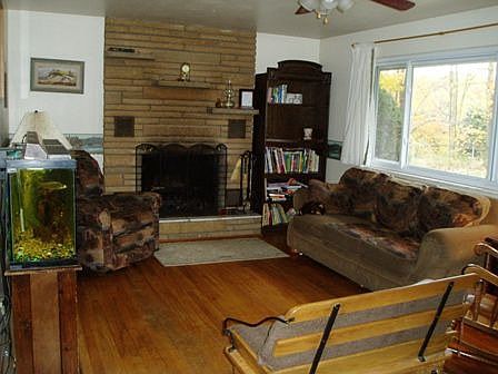 Living Room with Fireplace and Hardwood Floors